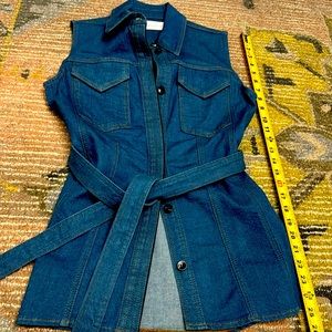 Denim  top with front pockets and tie around waist. Excellent condition.